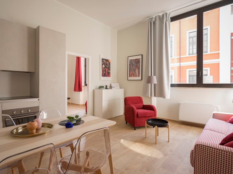 Clean, turnover-ready rental suite with fresh paint and neutral furnishings.